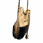 Chanel Gabrielle Bucket Bag Beige Black Quilted Leather CC Logo Chain Link Strap
