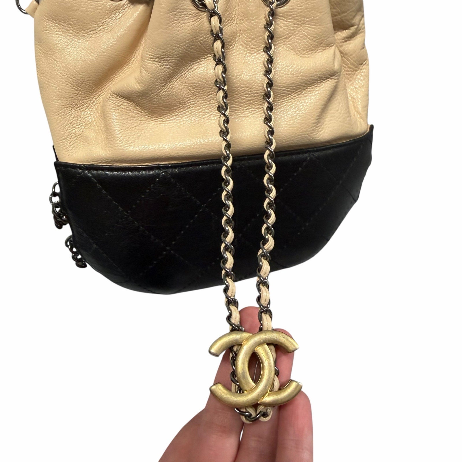 Chanel Gabrielle Bucket Bag Beige Black Quilted Leather CC Logo Chain Link Strap