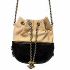 Chanel Gabrielle Bucket Bag Beige Black Quilted Leather CC Logo Chain Link Strap